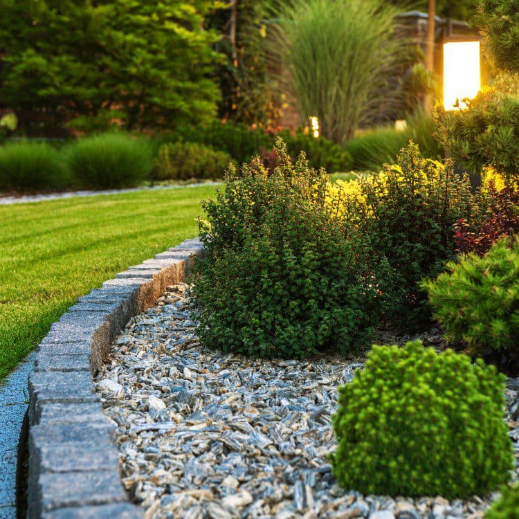 Residential landscape designed for efficient irrigation coverage in Kern County